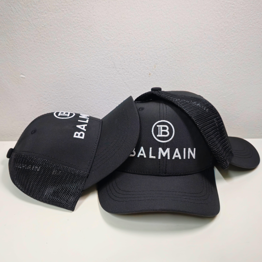 Monogram Shine Embroidery Cap with adjustable fit and breathable fabric. Stylish moire streetwear hat for men and women, perfect for casual wear.