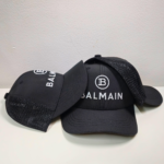 Monogram Shine Embroidery Cap with adjustable fit and breathable fabric. Stylish moire streetwear hat for men and women, perfect for casual wear.