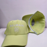 Monogram Shine Embroidery Cap with adjustable fit and breathable fabric. Stylish moire streetwear hat for men and women, perfect for casual wear.